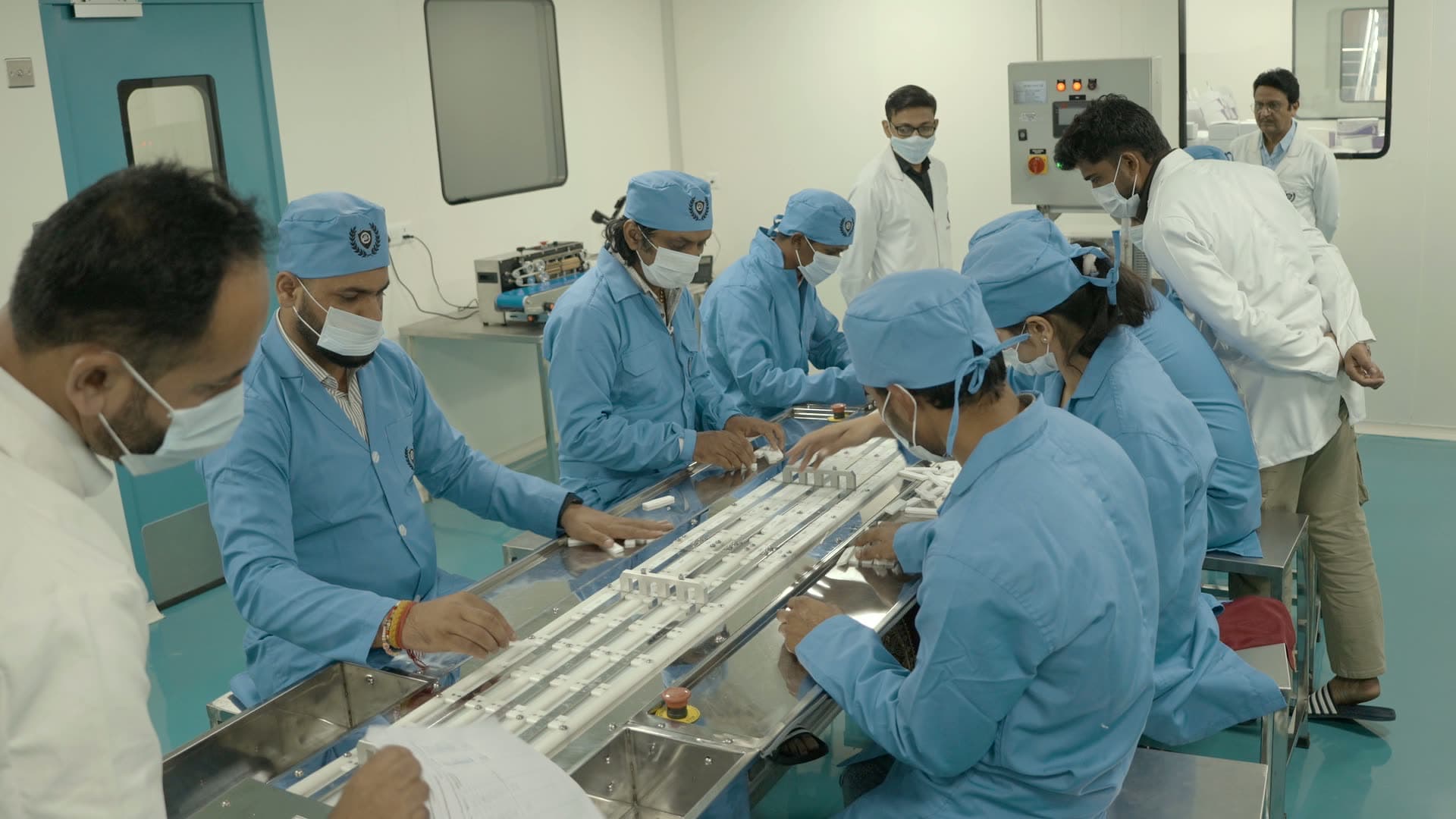 Technicians assembling diagnostic cassettes