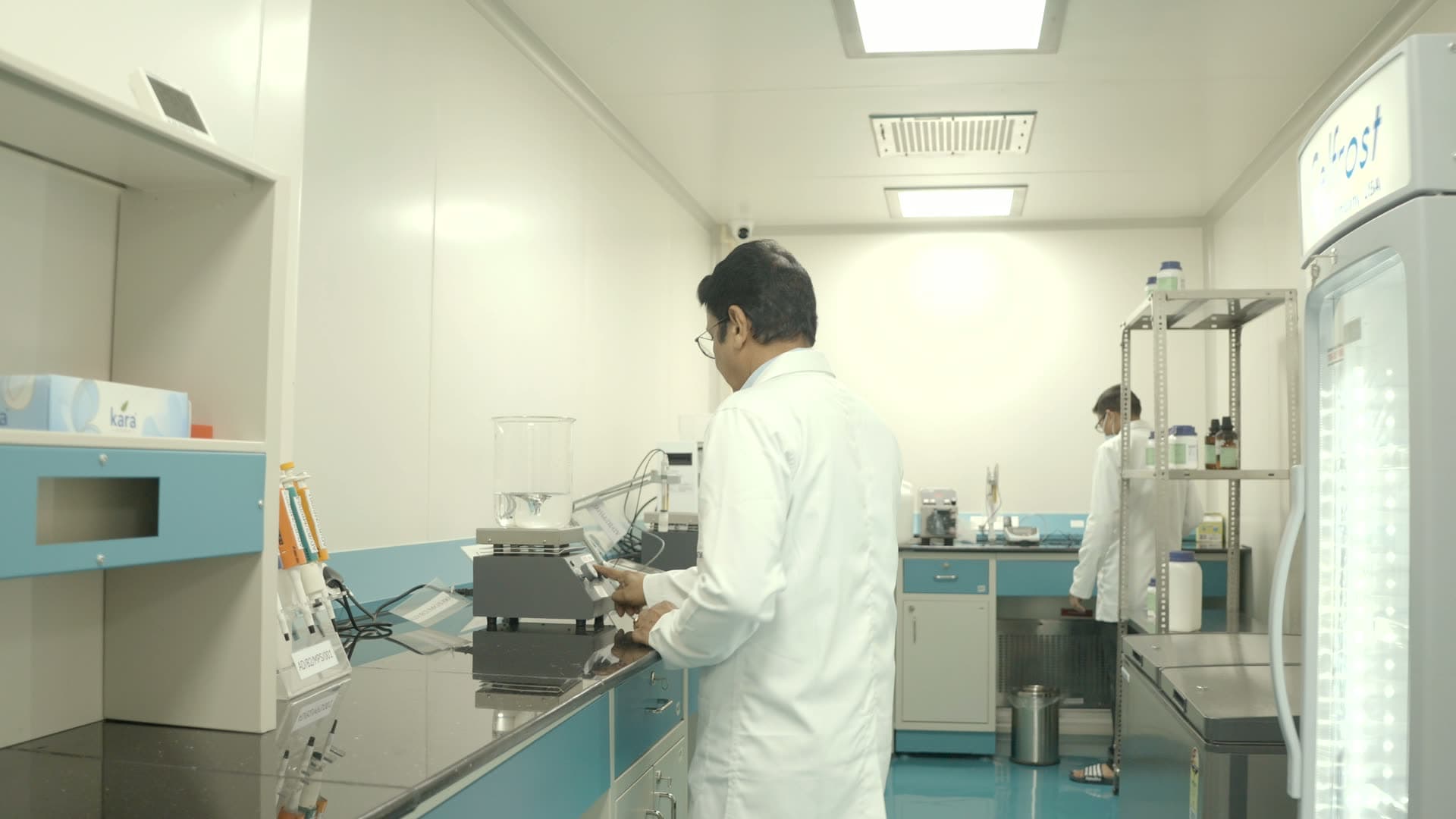 Scientist dispensing a sample
